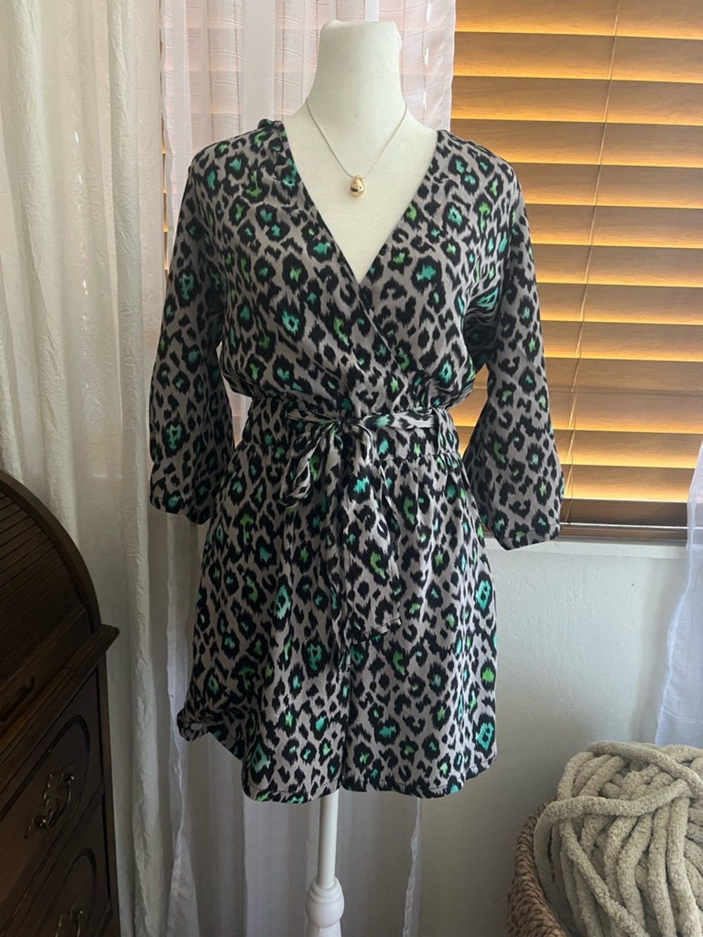 Animal Print Wrap romper with Green Accents